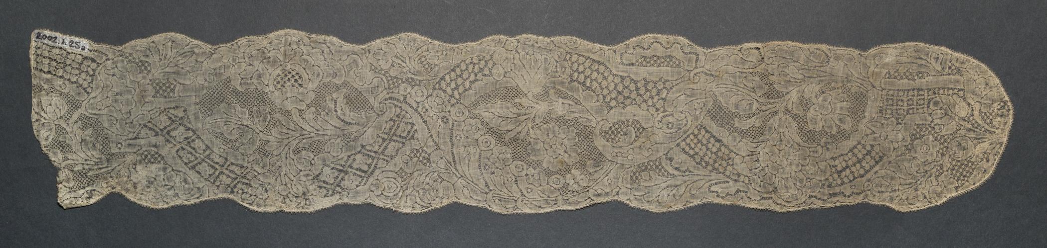 2002.0001.001.025 A Lappet, overall, reverse