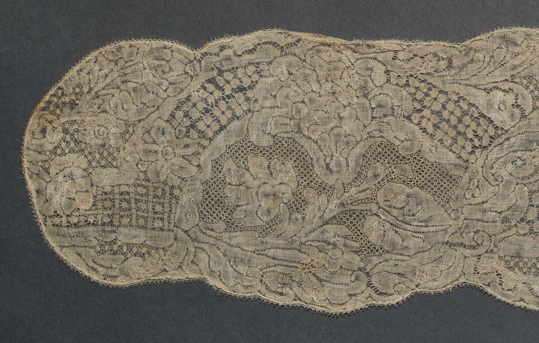 2002.0001.001.025 B Lappet, detail 1, reverse