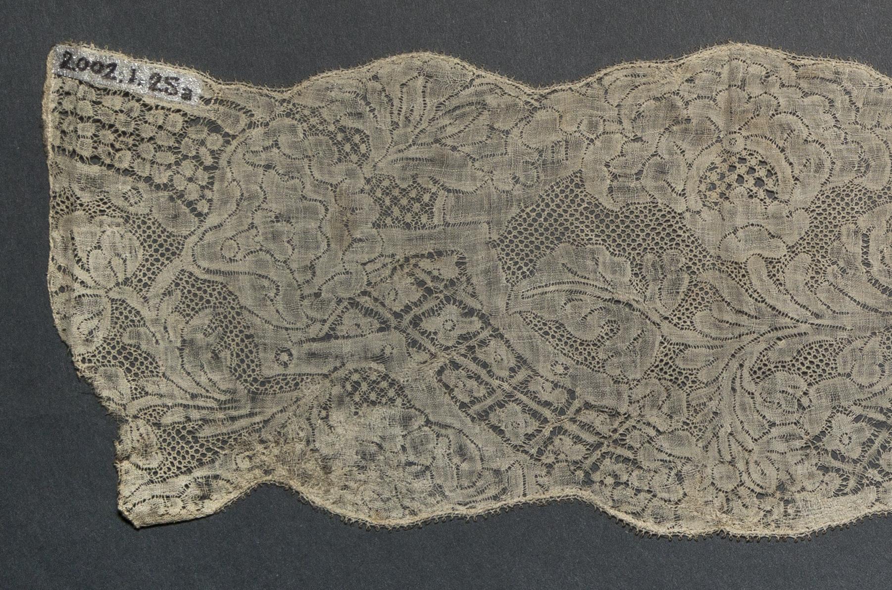 2002.0001.001.025 A Lappet, detail 3, reverse