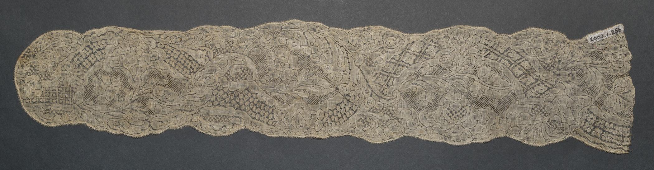 2002.0001.001.025 B Lappet, overall, reverse