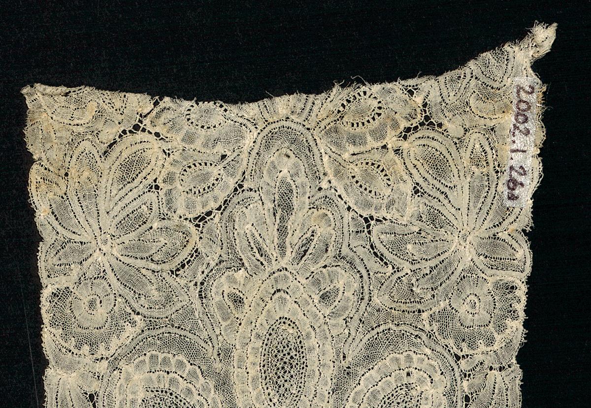 2002.0001.001.026 A Lappet, detail 1, reverse