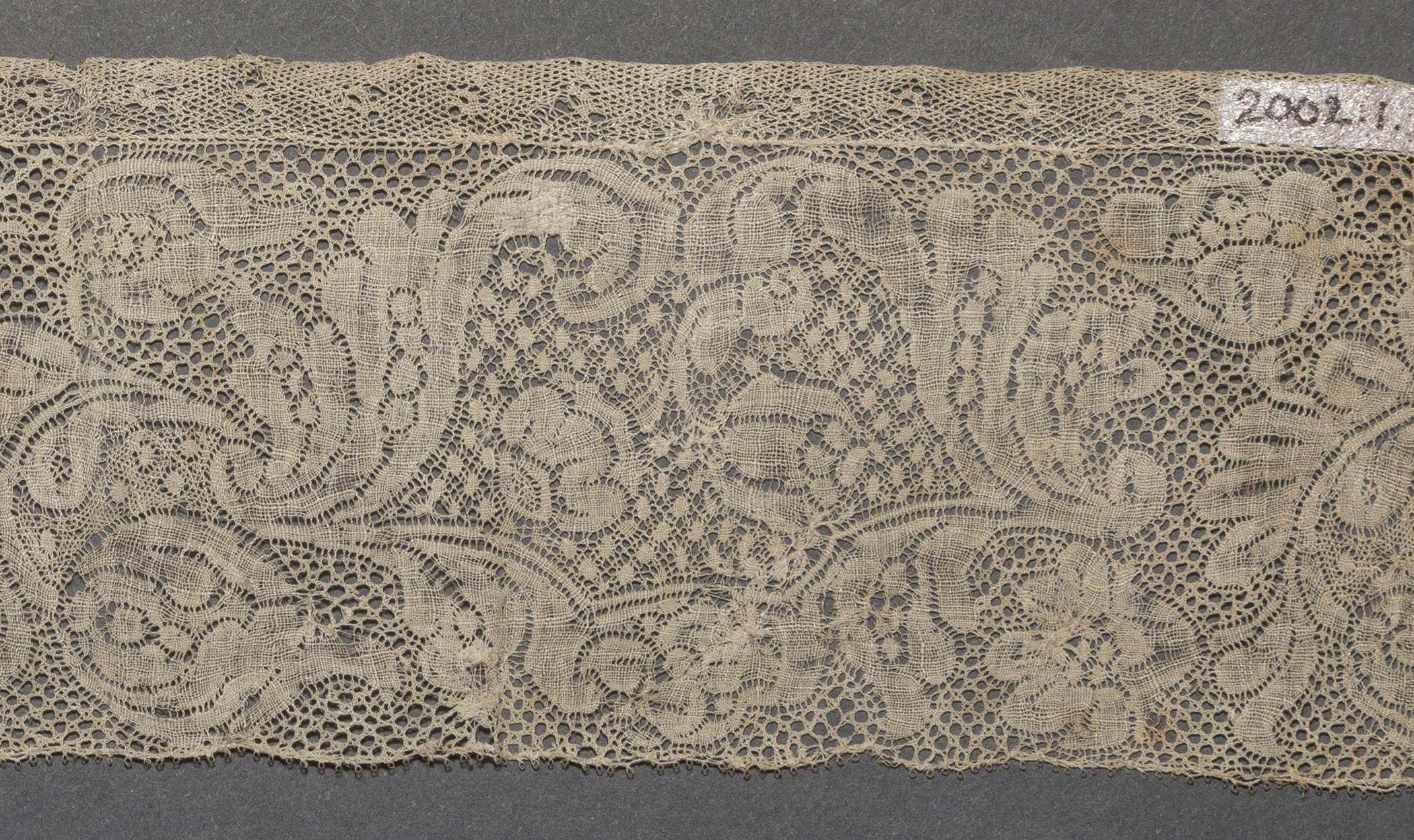 2002.0001.001.027 C Passamenterie, detail 1, reverse