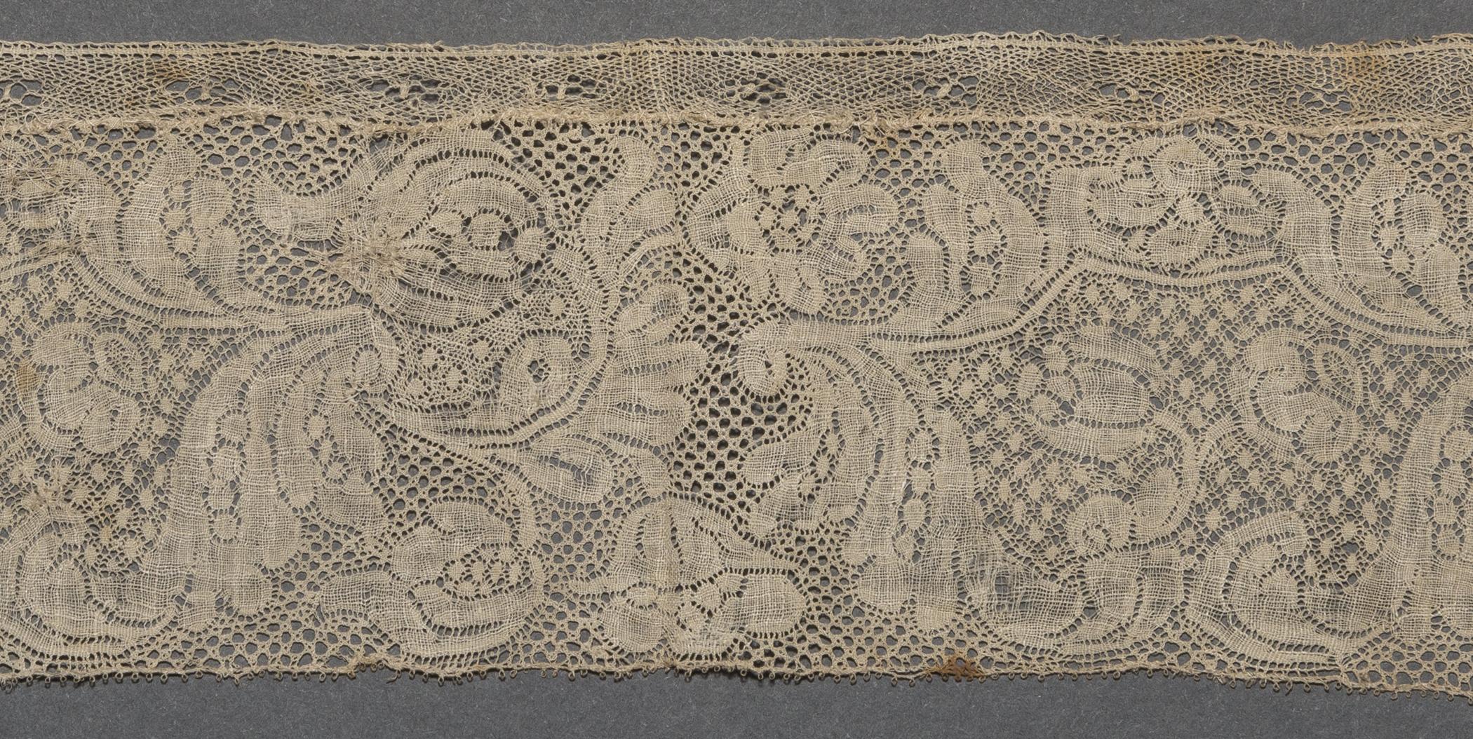 2002.0001.001.027 B Passamenterie, detail 1, reverse