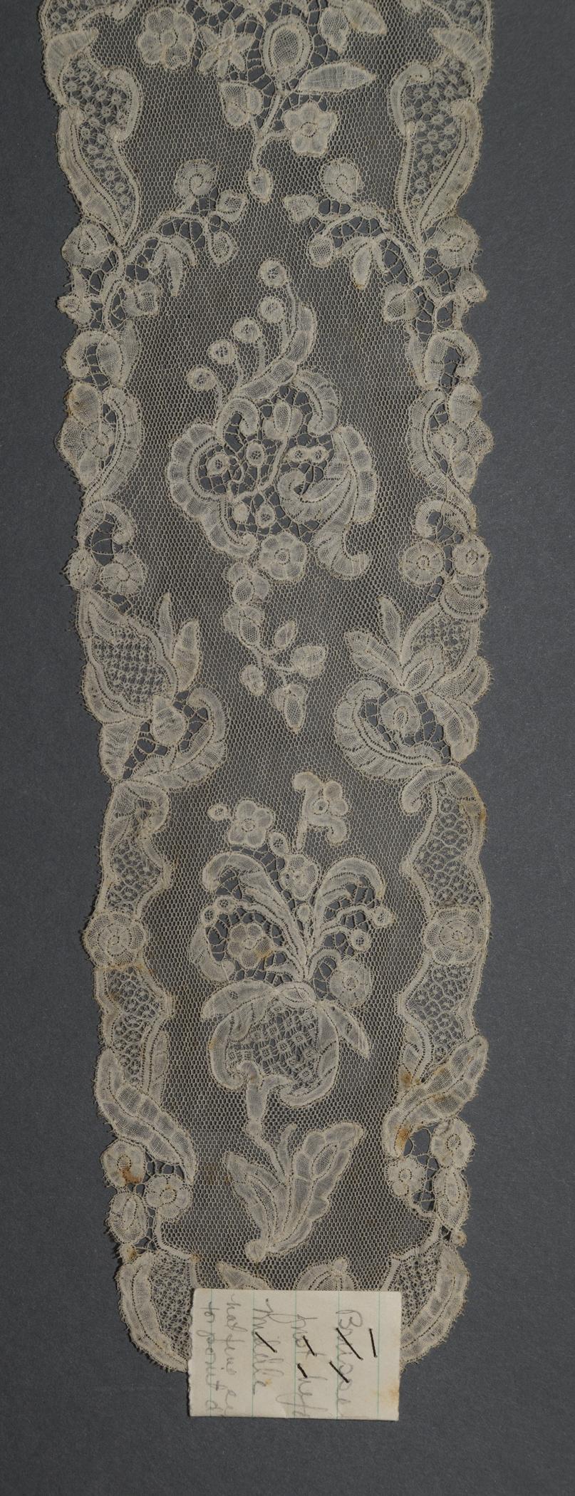 2002.0001.001.043 Lappet, detail 1, reverse