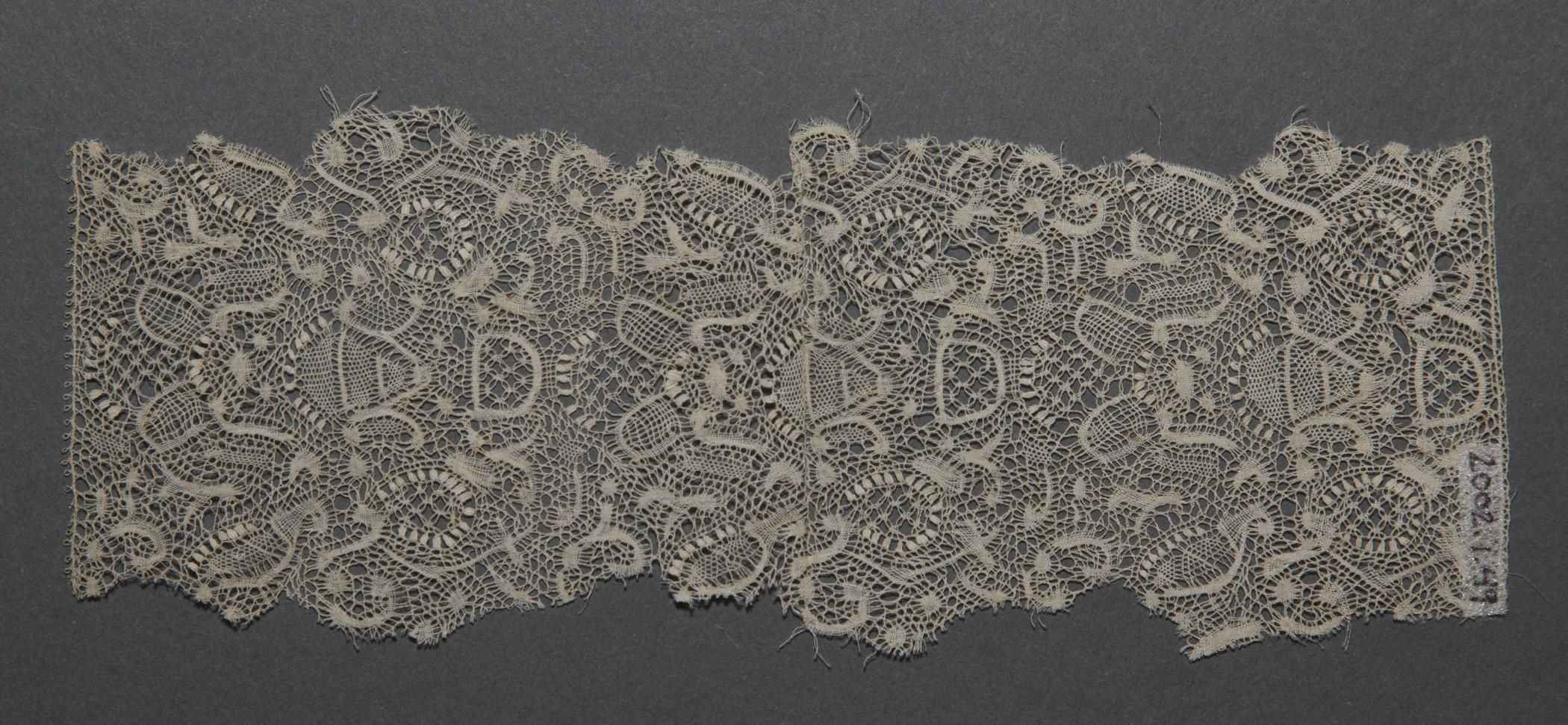 2002.0001.001.049 Textile fragment, overall, reverse