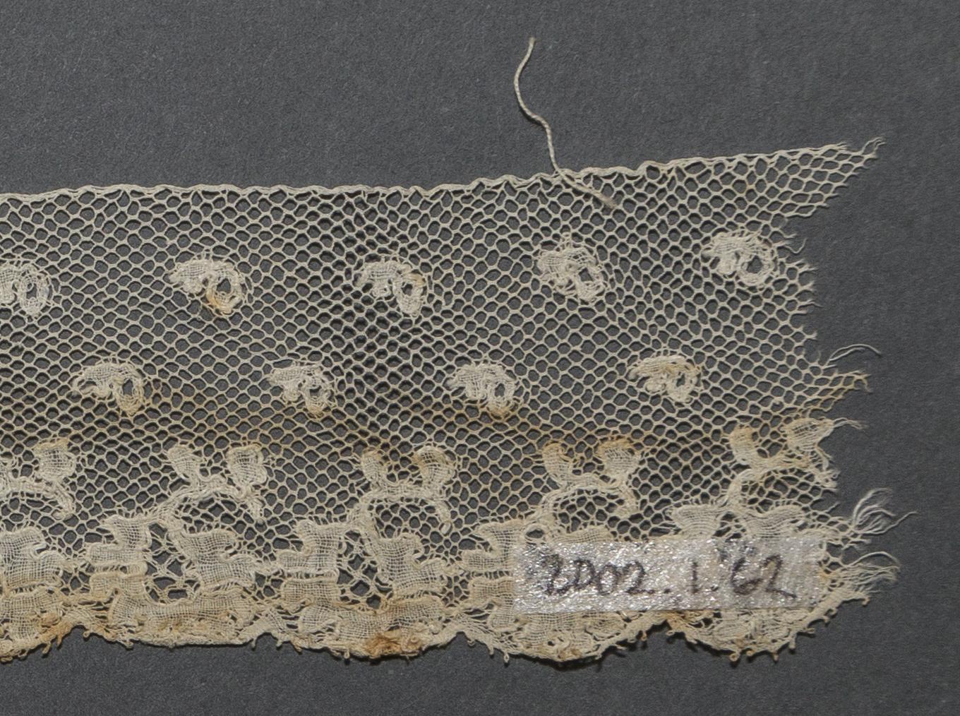 2002.0001.001.062 Passementerie, detail 1, reverse