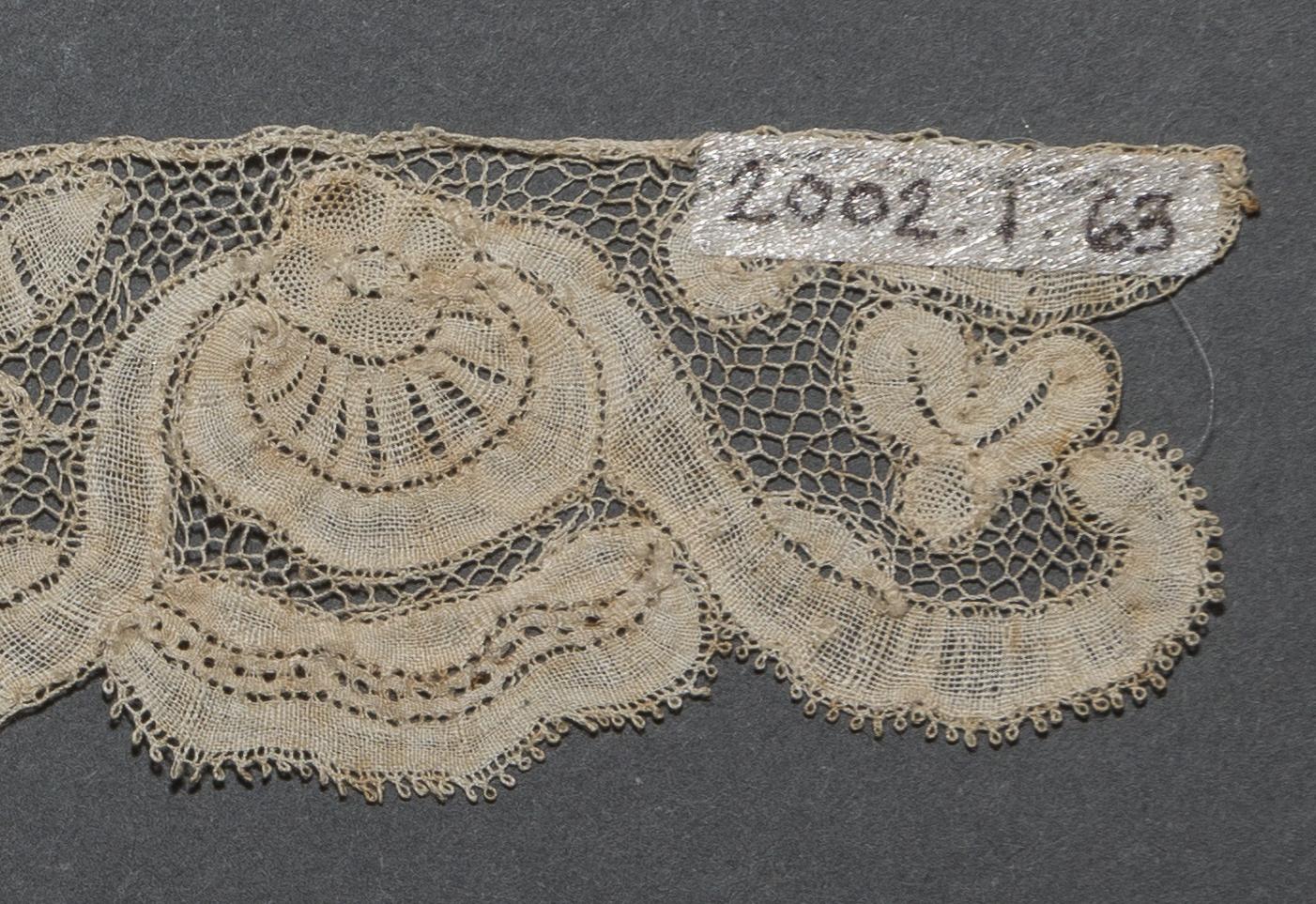 2002.0001.001.063 Passementerie, detail 1, reverse