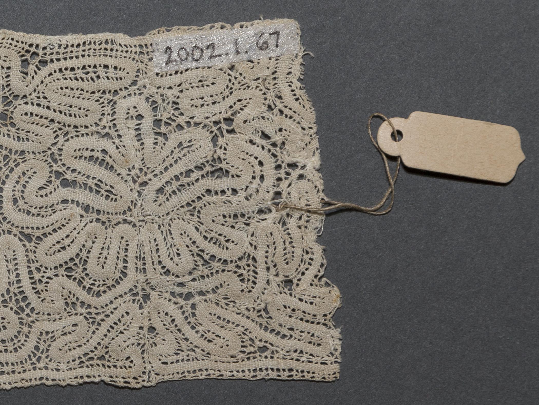 2002.0001.001.067 Passementerie, detail 1, reverse