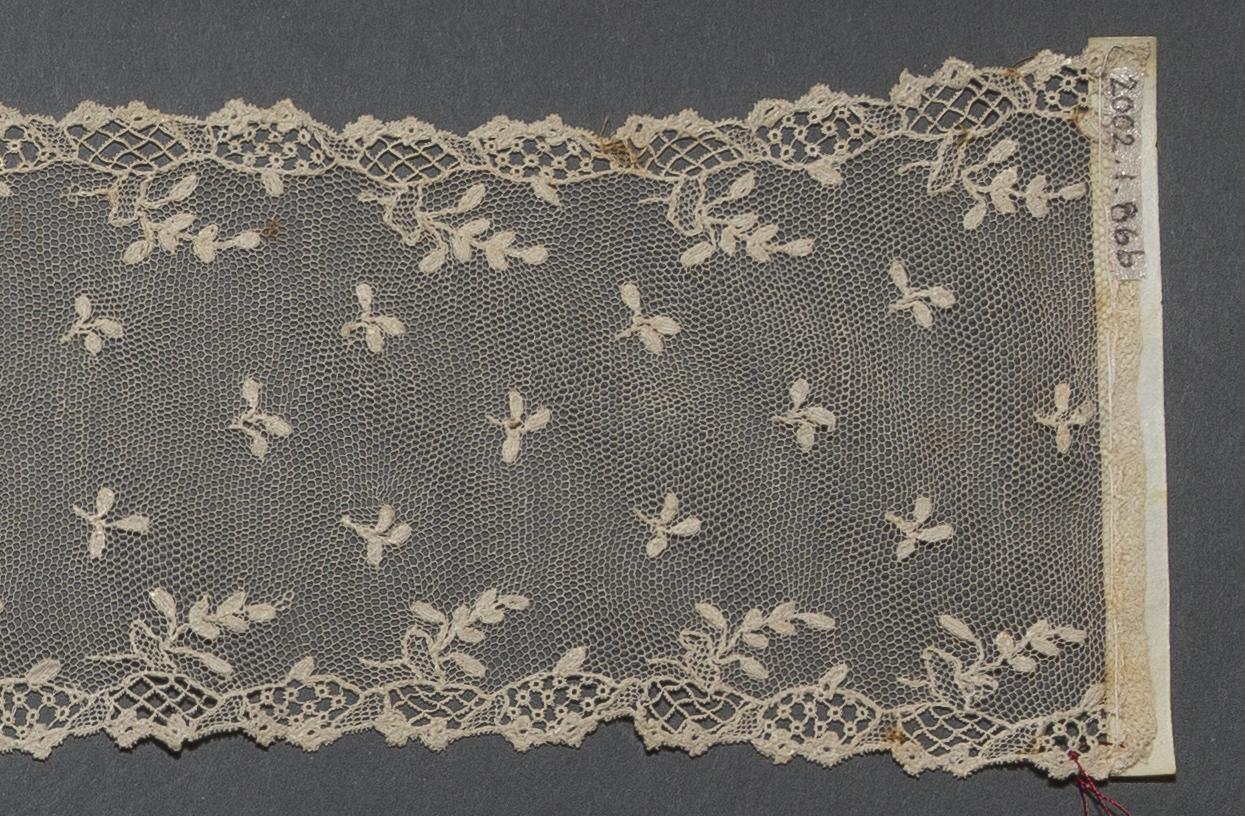 2002.0001.001.086 B Lappet, detail 1, reverse