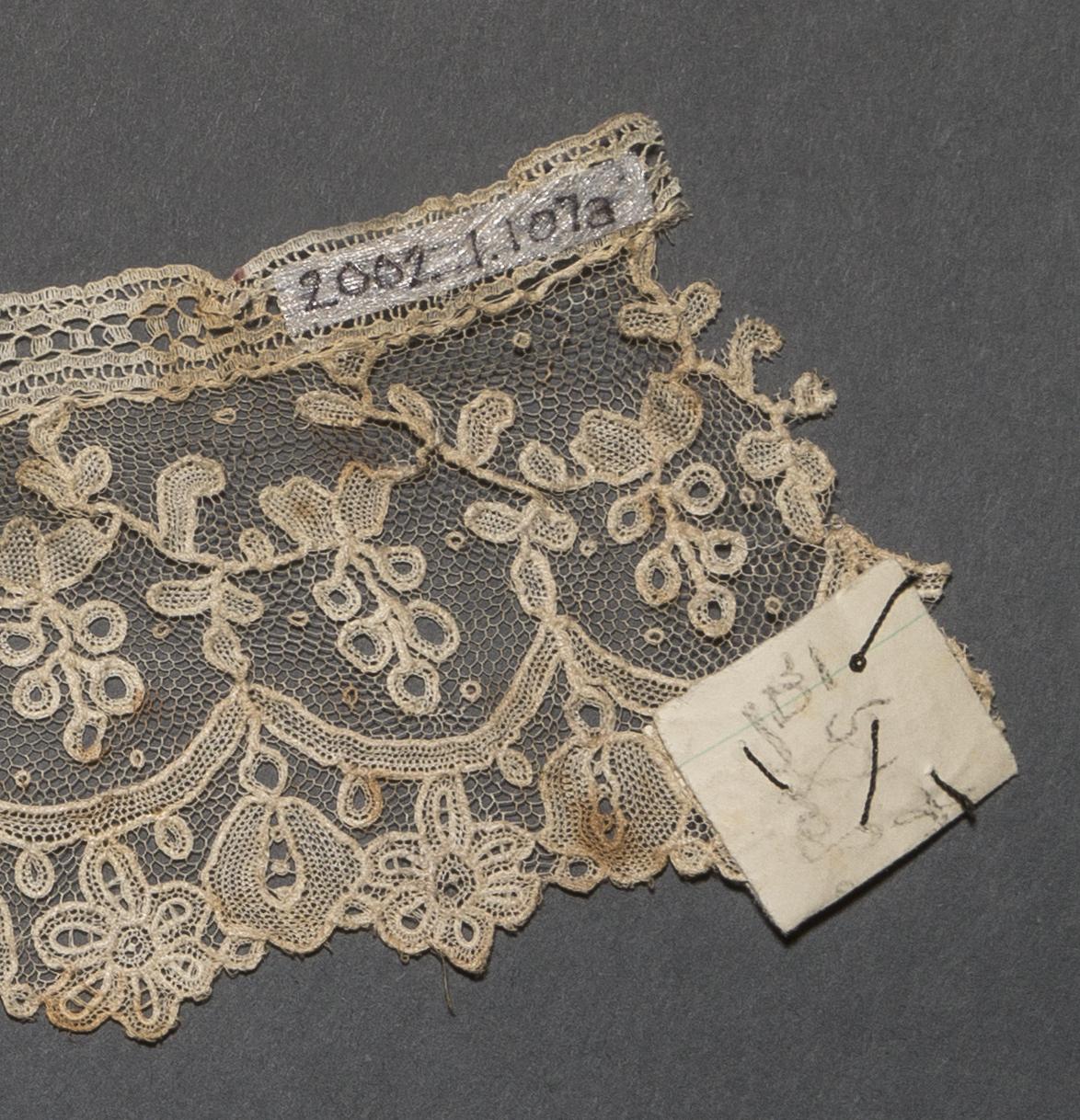2002.0001.001.107 A Passamenterie, detail 1, reverse