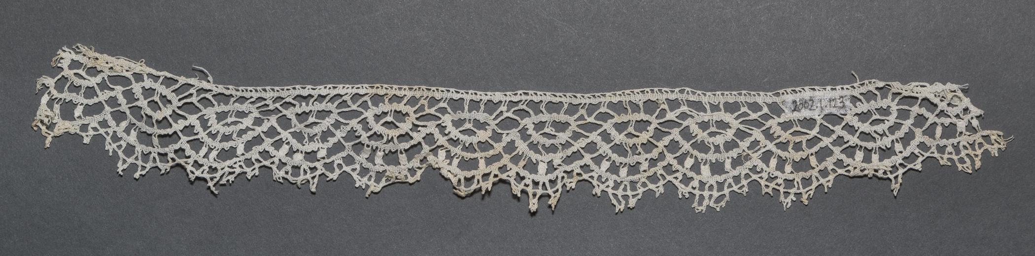 2002.0001.001.123 Passementerie, overall, reverse