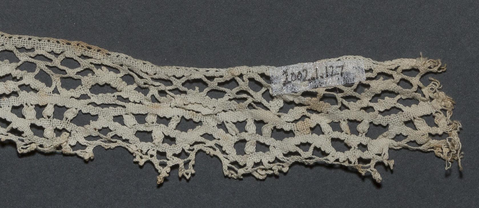 2002.0001.001.127 Passementerie, detail 1, reverse
