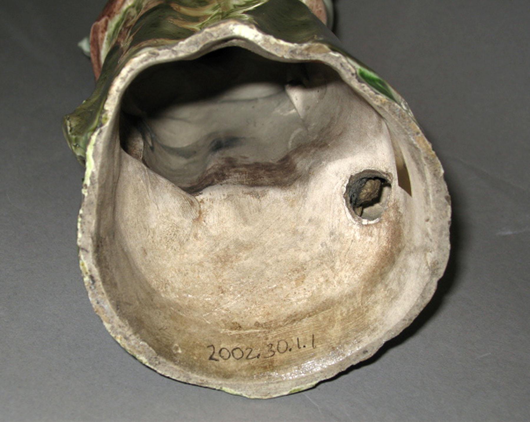 2002.0030.001.001 Pearlware figure (underside)
