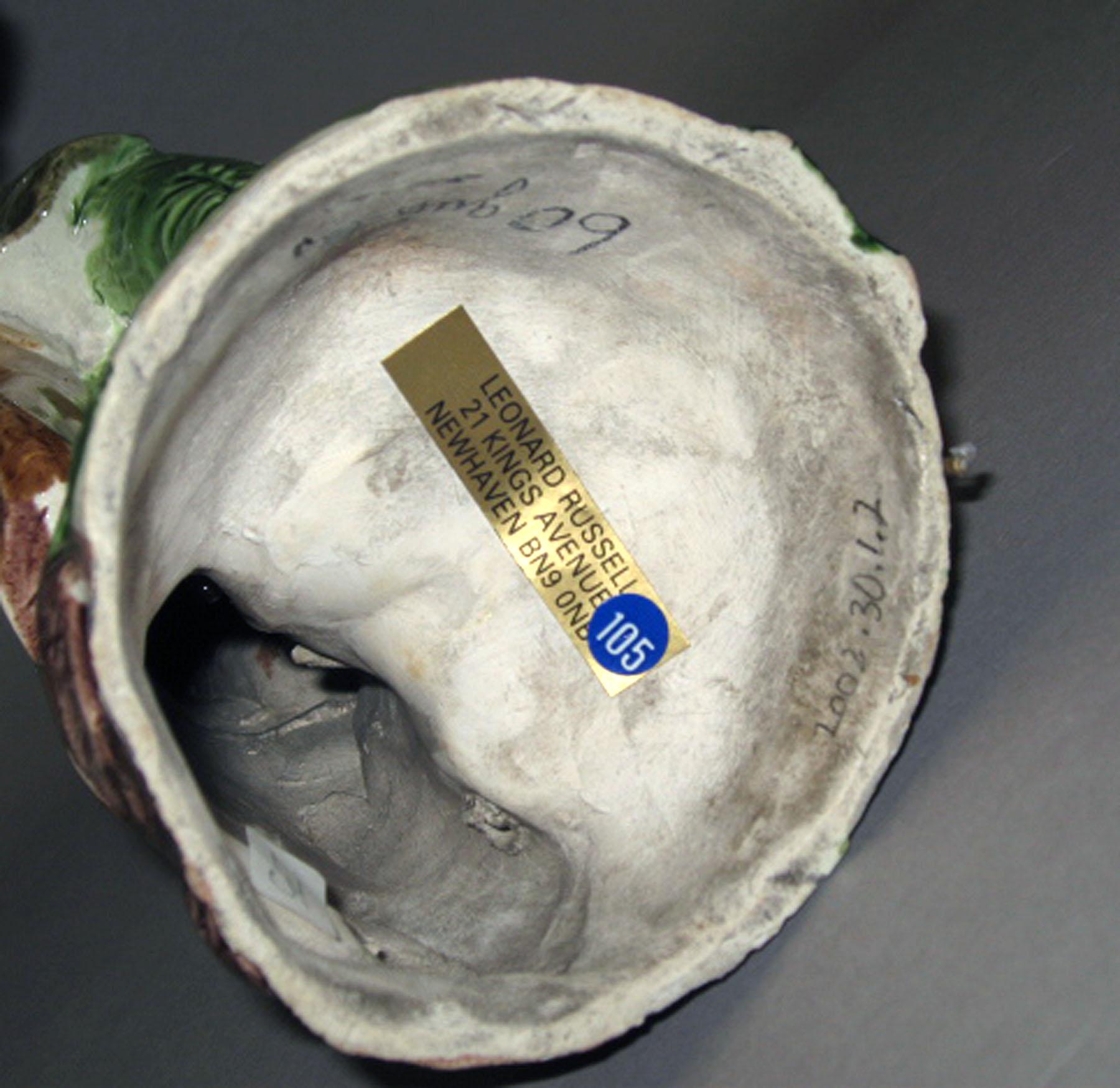 2002.0030.001.002 Pearlware figure (underside)
