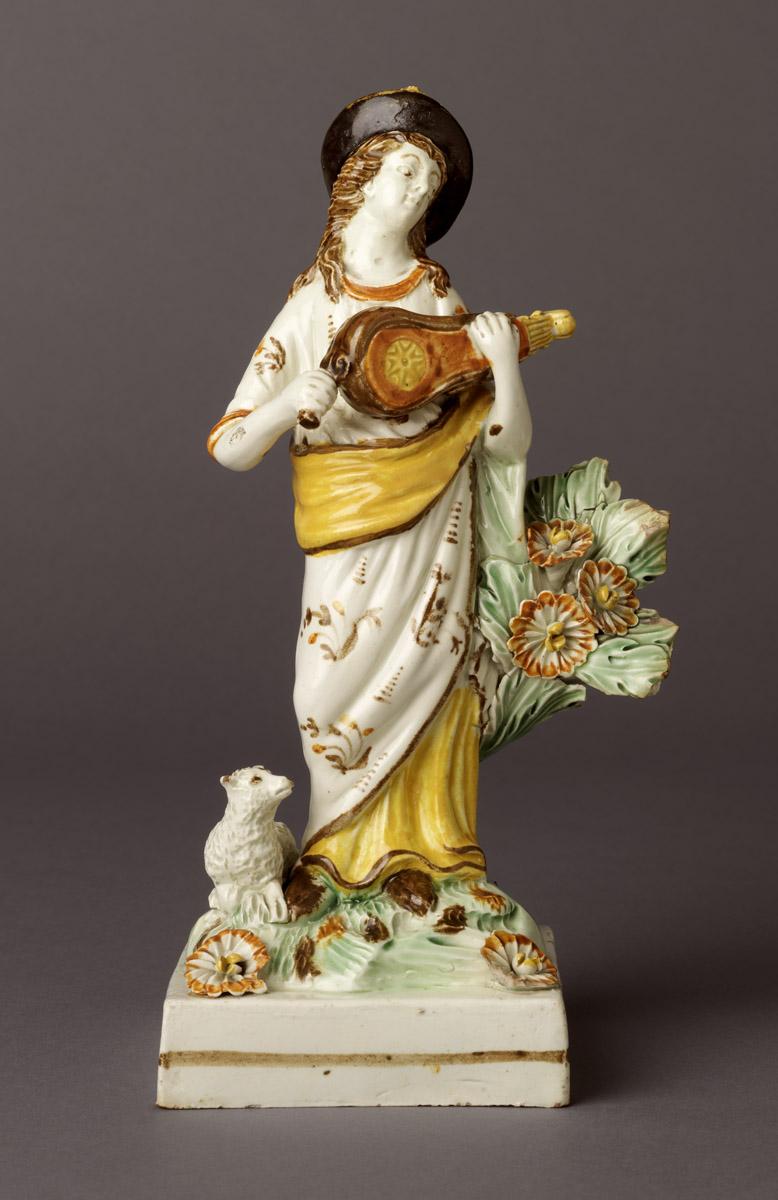 2002.0030.013 Hurdy-gurdy female figure