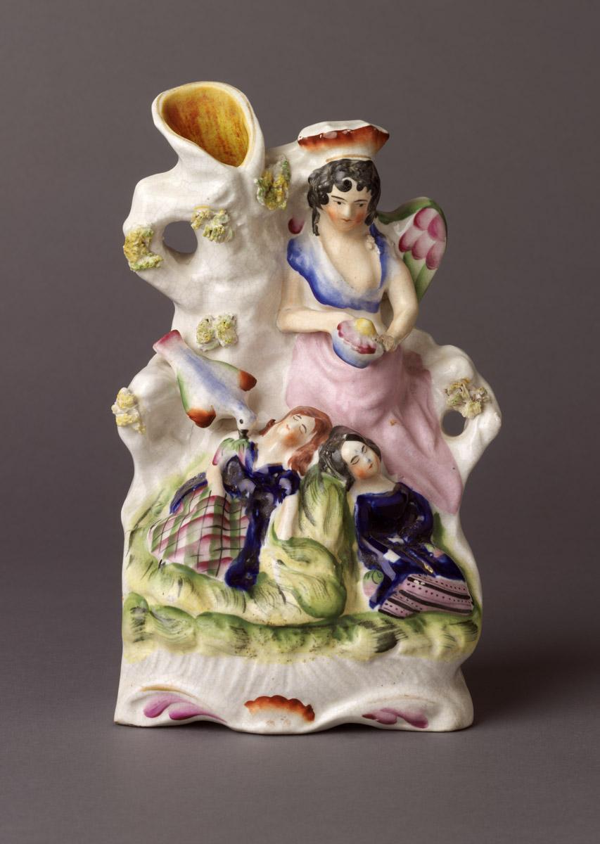 2002.0030.149 Pearlware figure group/ spill vase