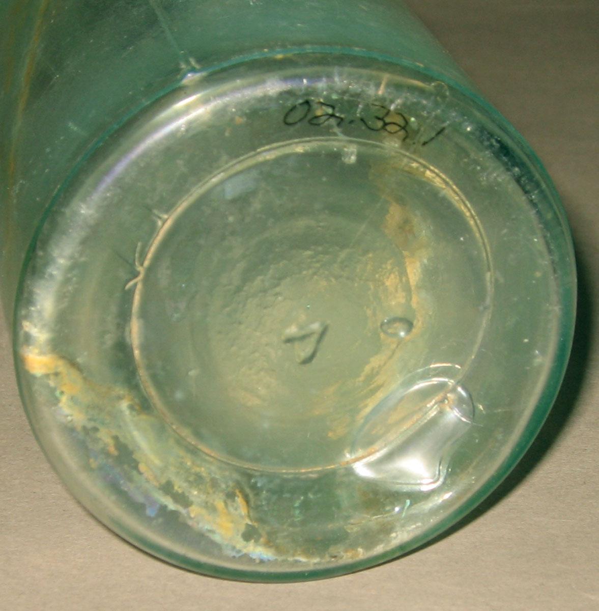 2002.0032.001 Glass bottle (underside)