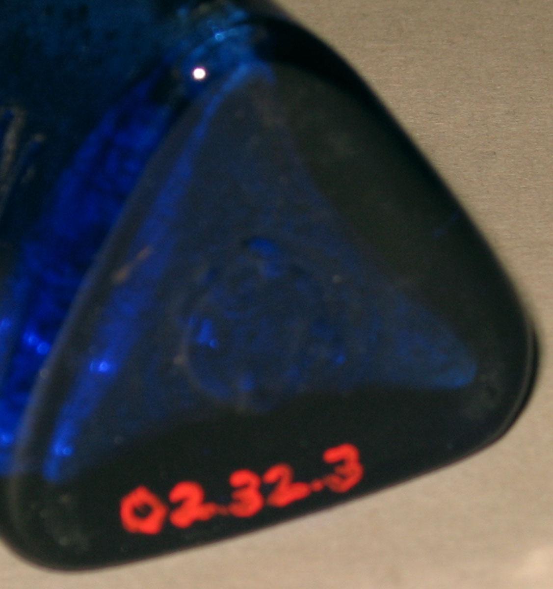 2002.0032.003 Blue glass medicine bottle (underside)