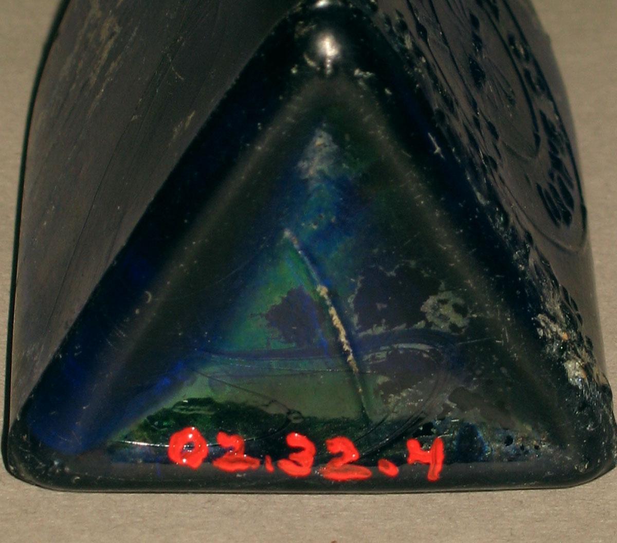 2002.0032.004 Blue glass medicine bottle (underside)
