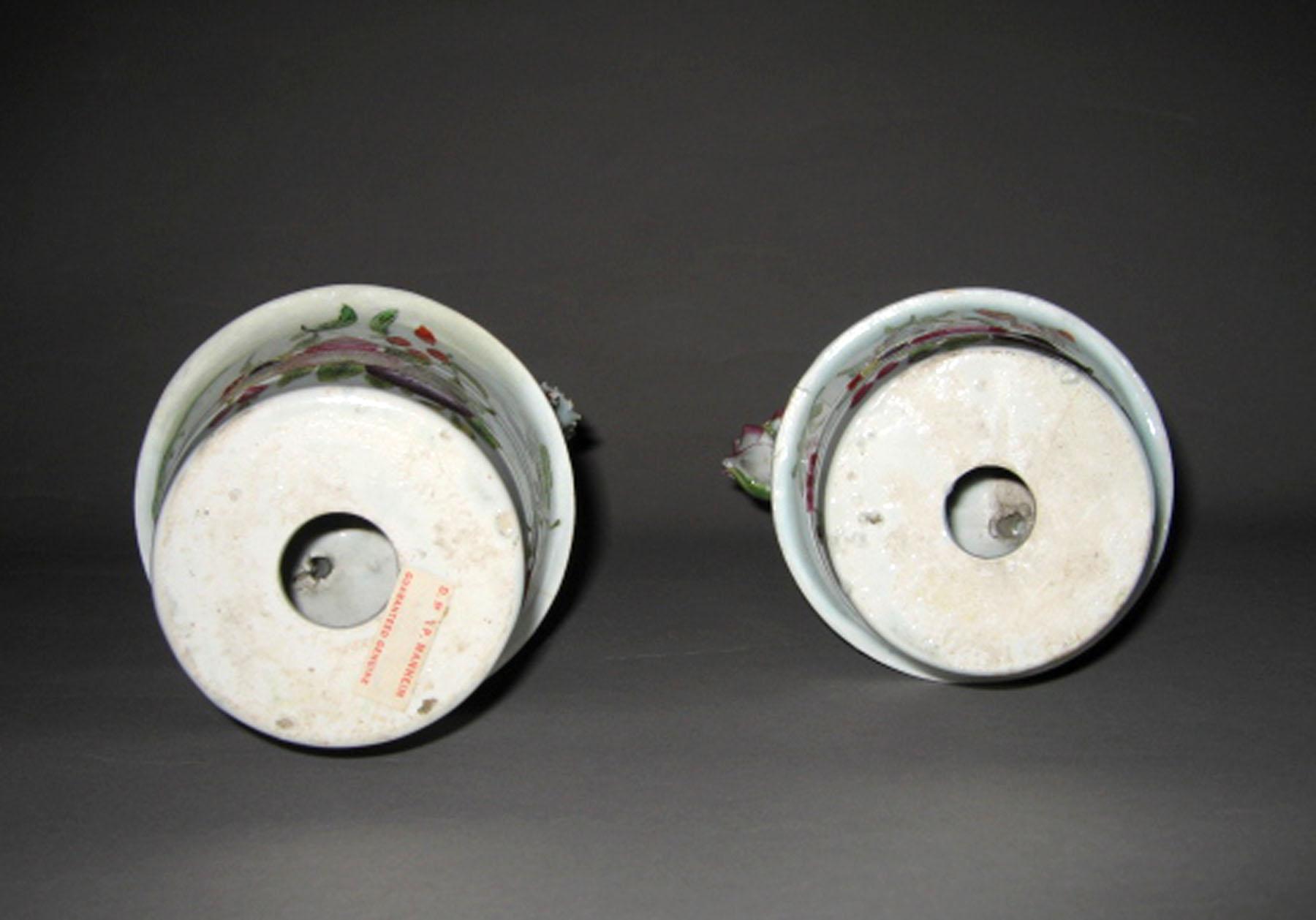 2003.0013.085.001, .002 Porcelain pots with modeled flowers (undersides)