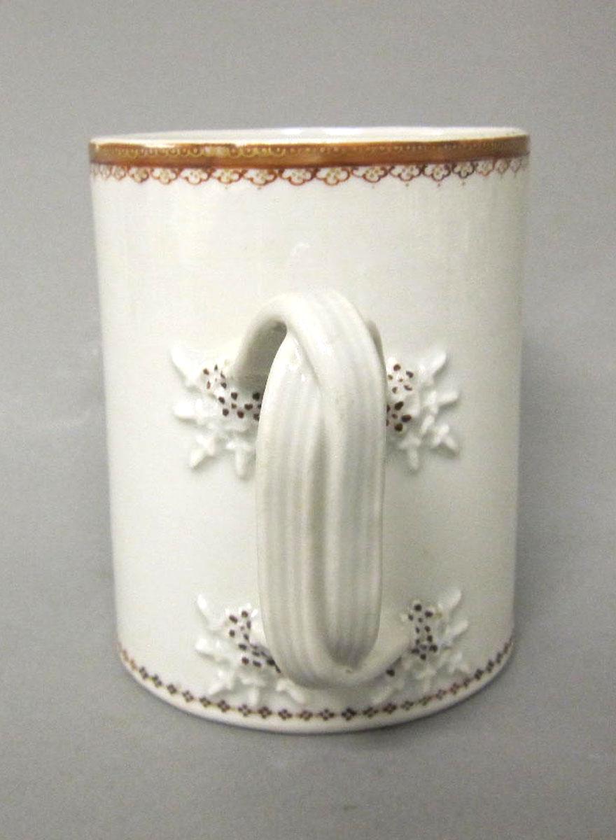 2003.0013.114 Porcelain mug handle