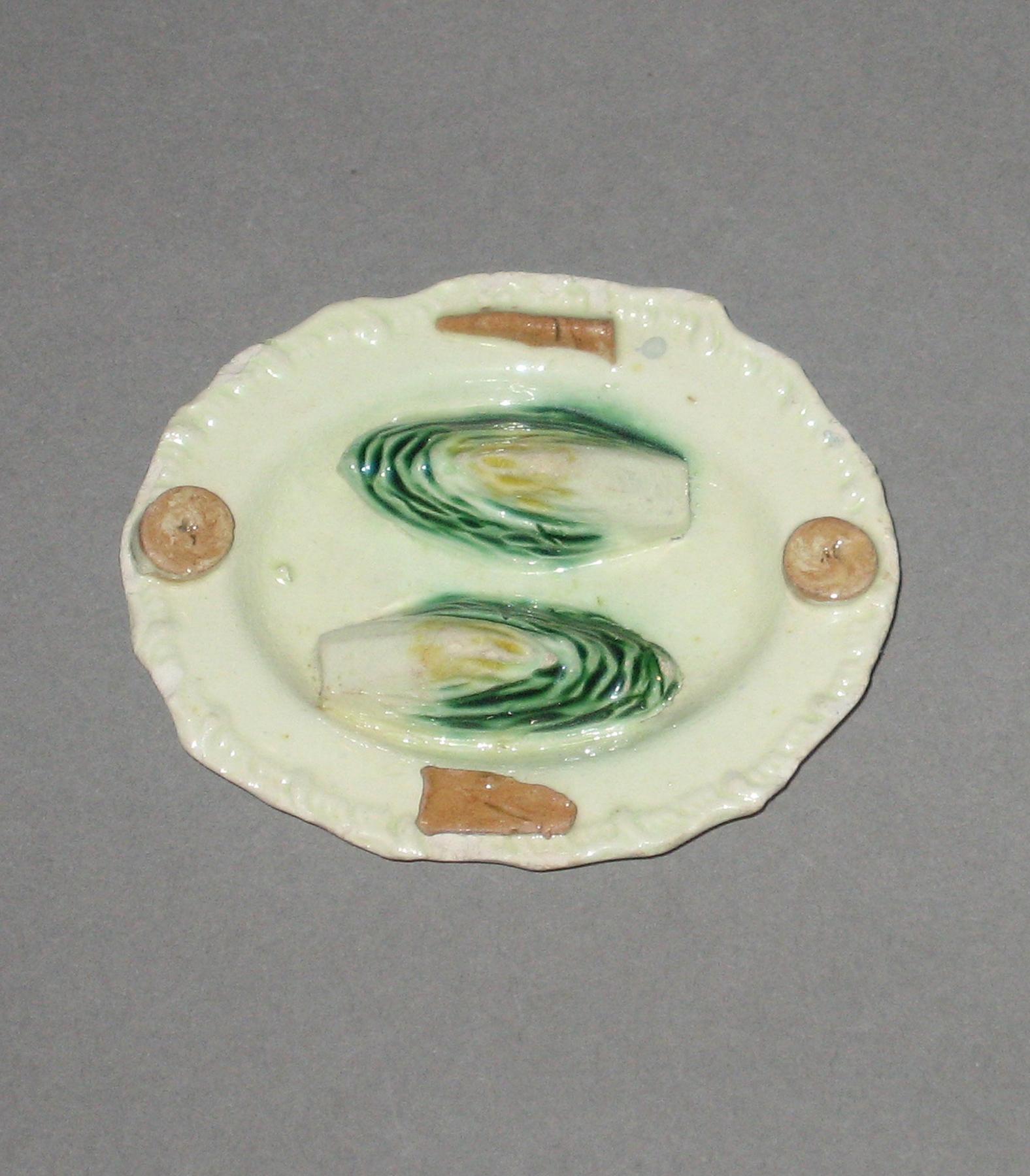 2003.0013.135.010 Miniature cabbage or endive dish