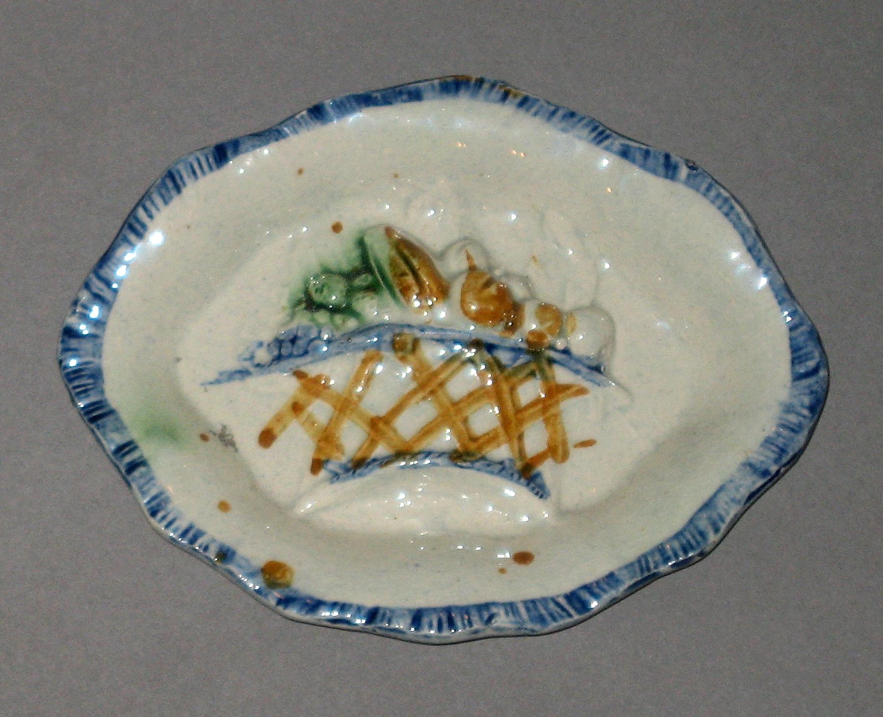2003.0013.135.012 Miniature fruit basket dish