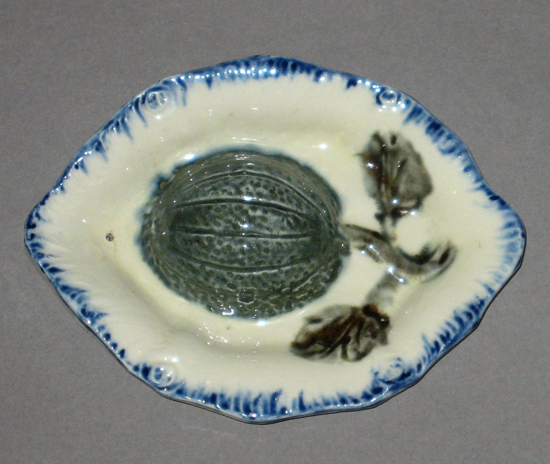 2003.0013.135.013 Miniature melon or squash dish