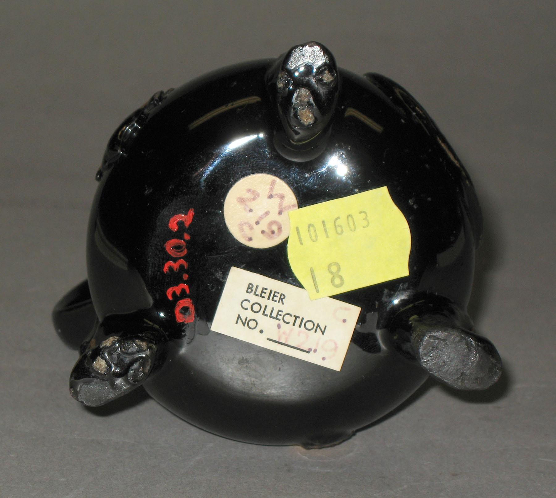 2003.0030.002 Blackware cream jug (bottom)