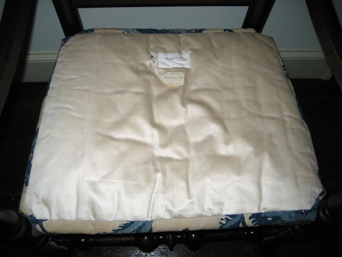 1969.5567 cushion on chair 1958.1022  view 2