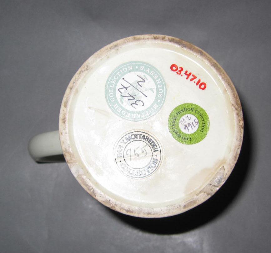 2003.0047.010 Creamware mug (underside)