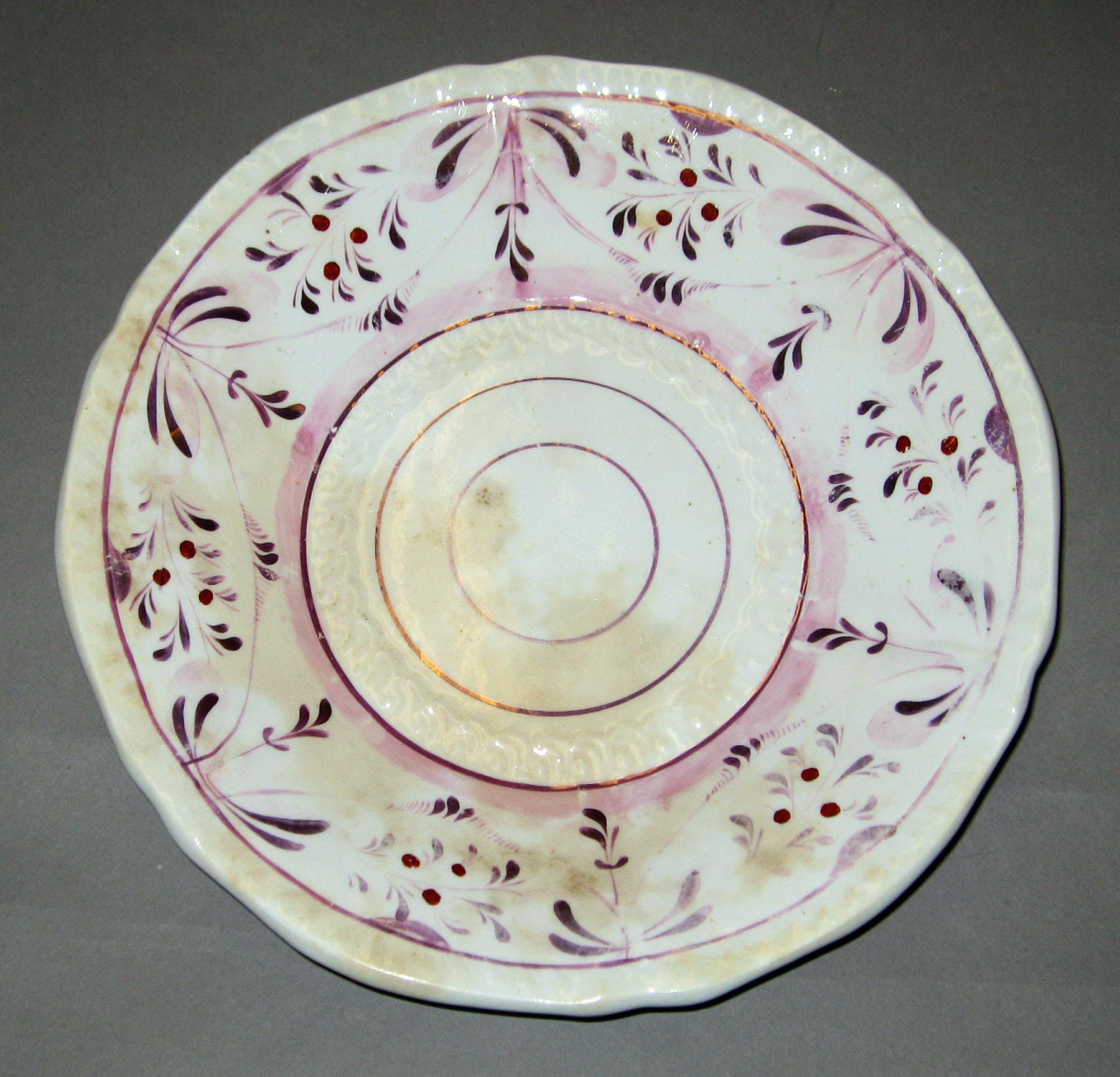 2004.0018.001.005 Lusterware Saucer