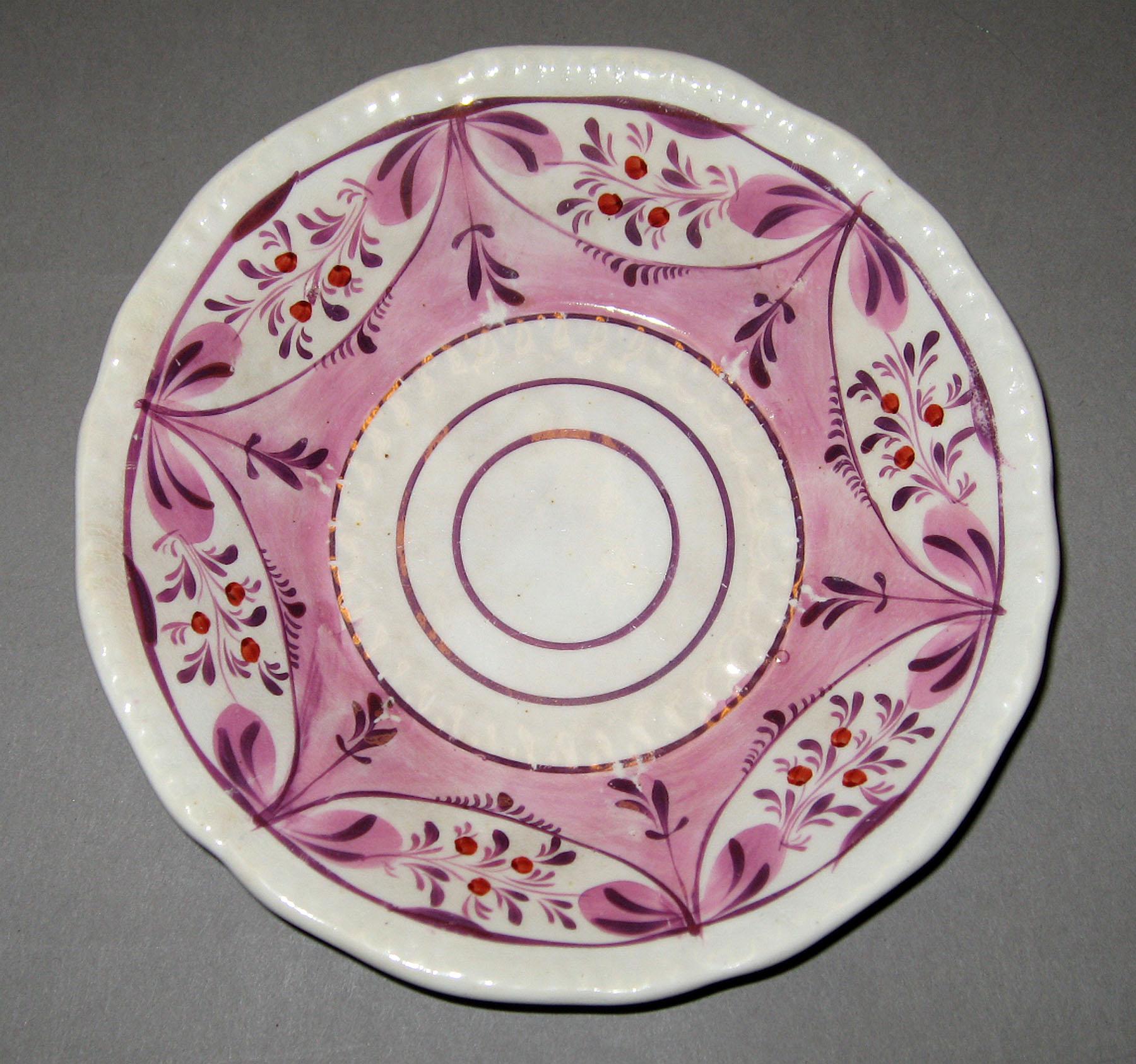2004.0018.001.010 Lusterware Saucer