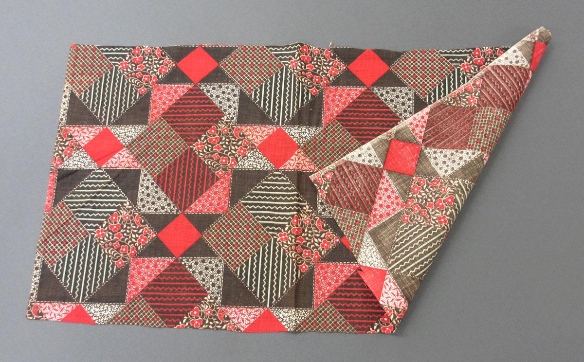 2004.0027 Textile, printed folded corner