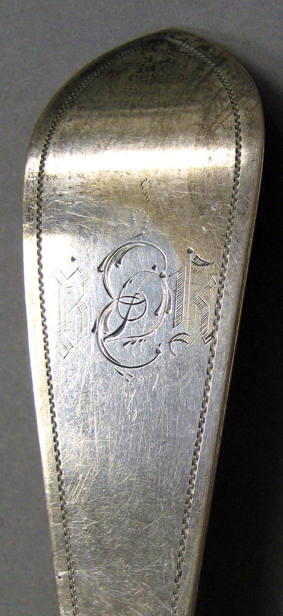 2004.0066.057 Silver Spoon engraving