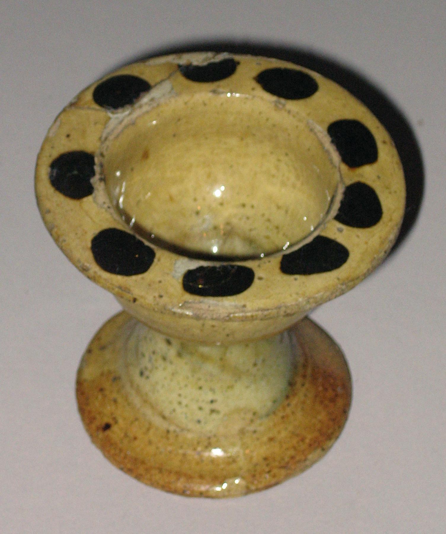 1958.1084 Slipware salt or egg cup