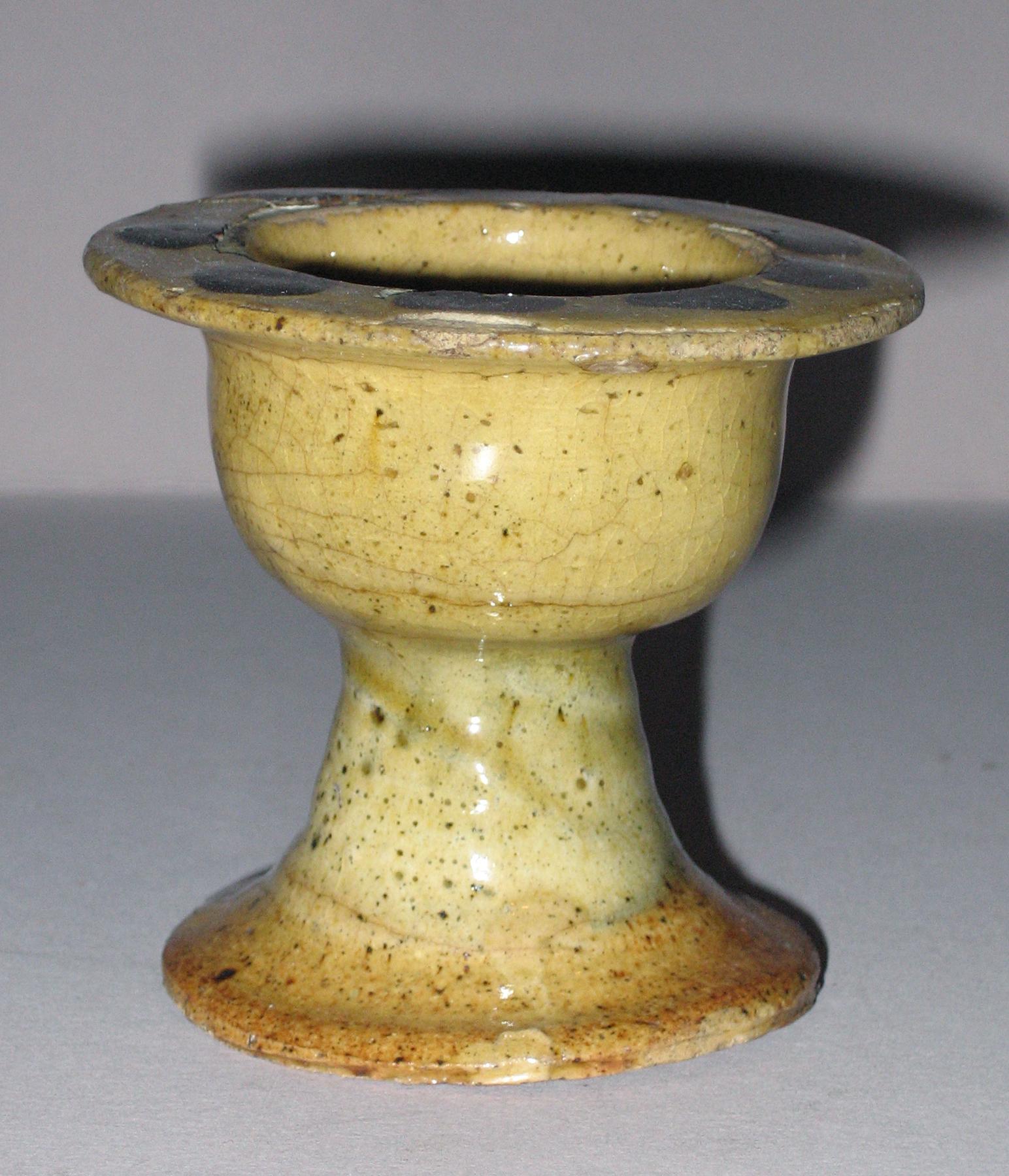 1958.1084 Slipware salt or egg cup (side)