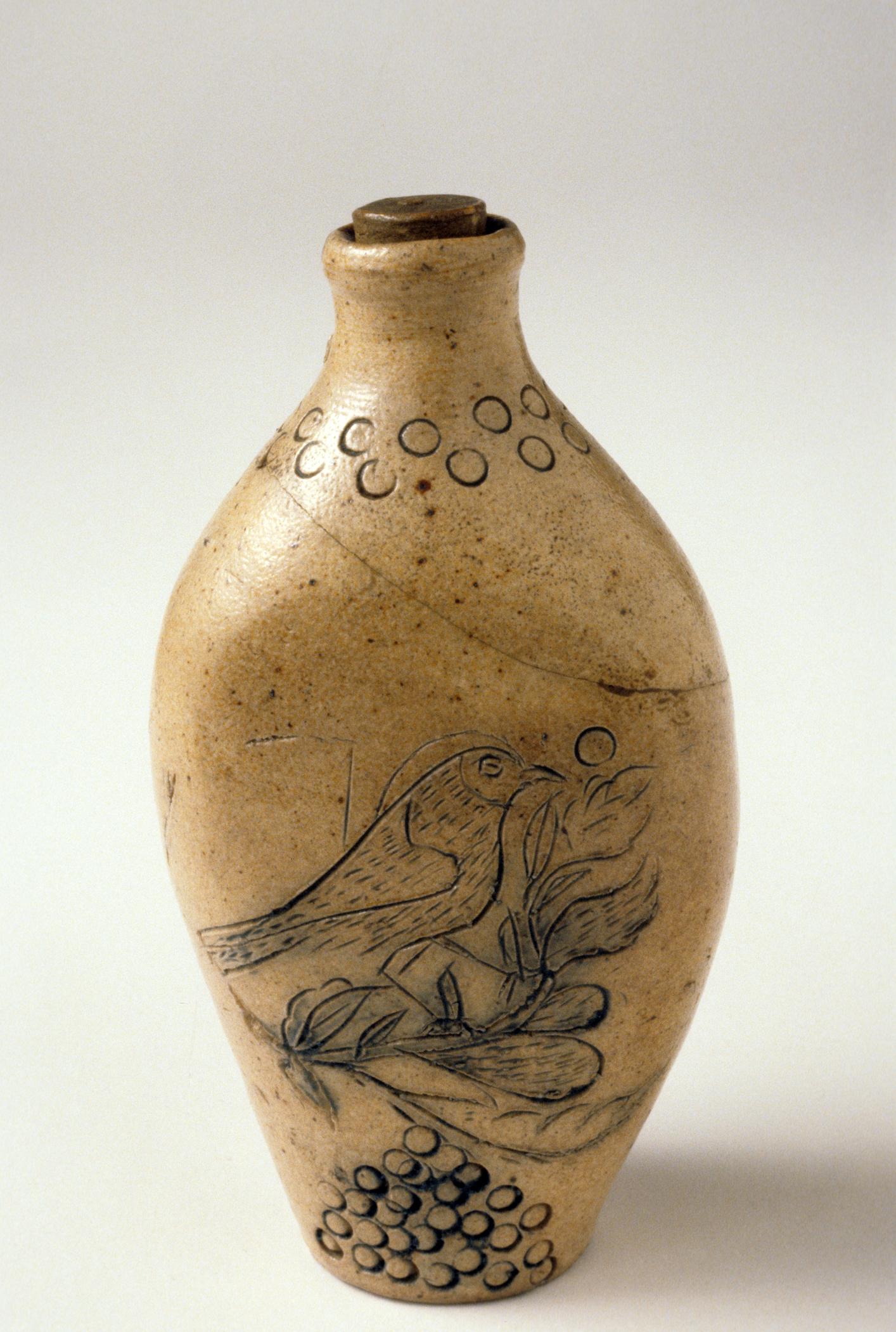 1958.1103 A, B Salt-glazed stoneware flask or pocket bottle (side 2)