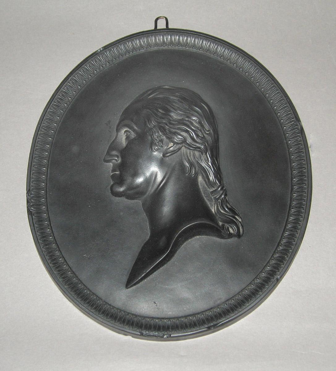 1958.1166 Basalt plaque