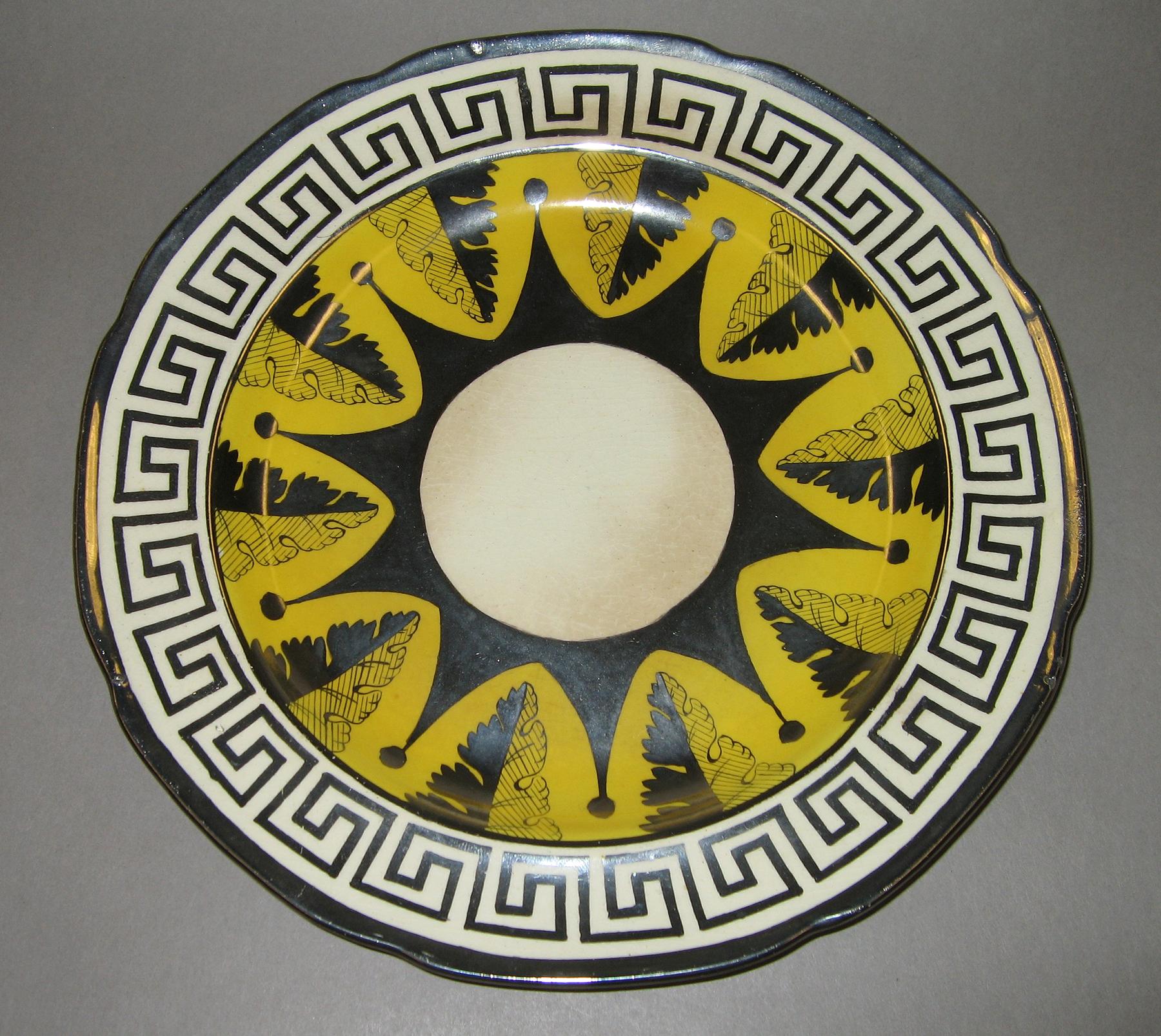 1958.1287 Luster and canary plate