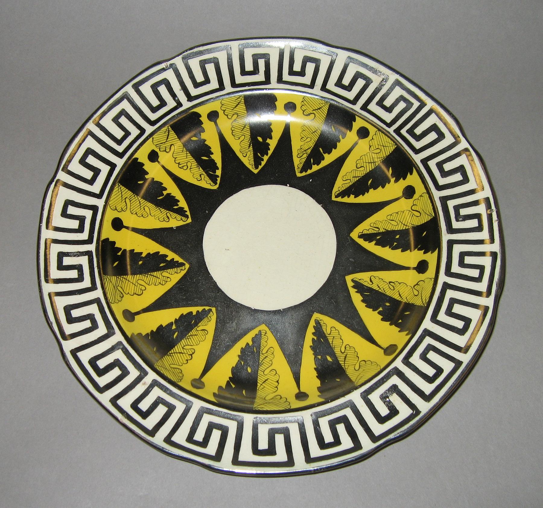 1958.1289 Silver and canary luster plate