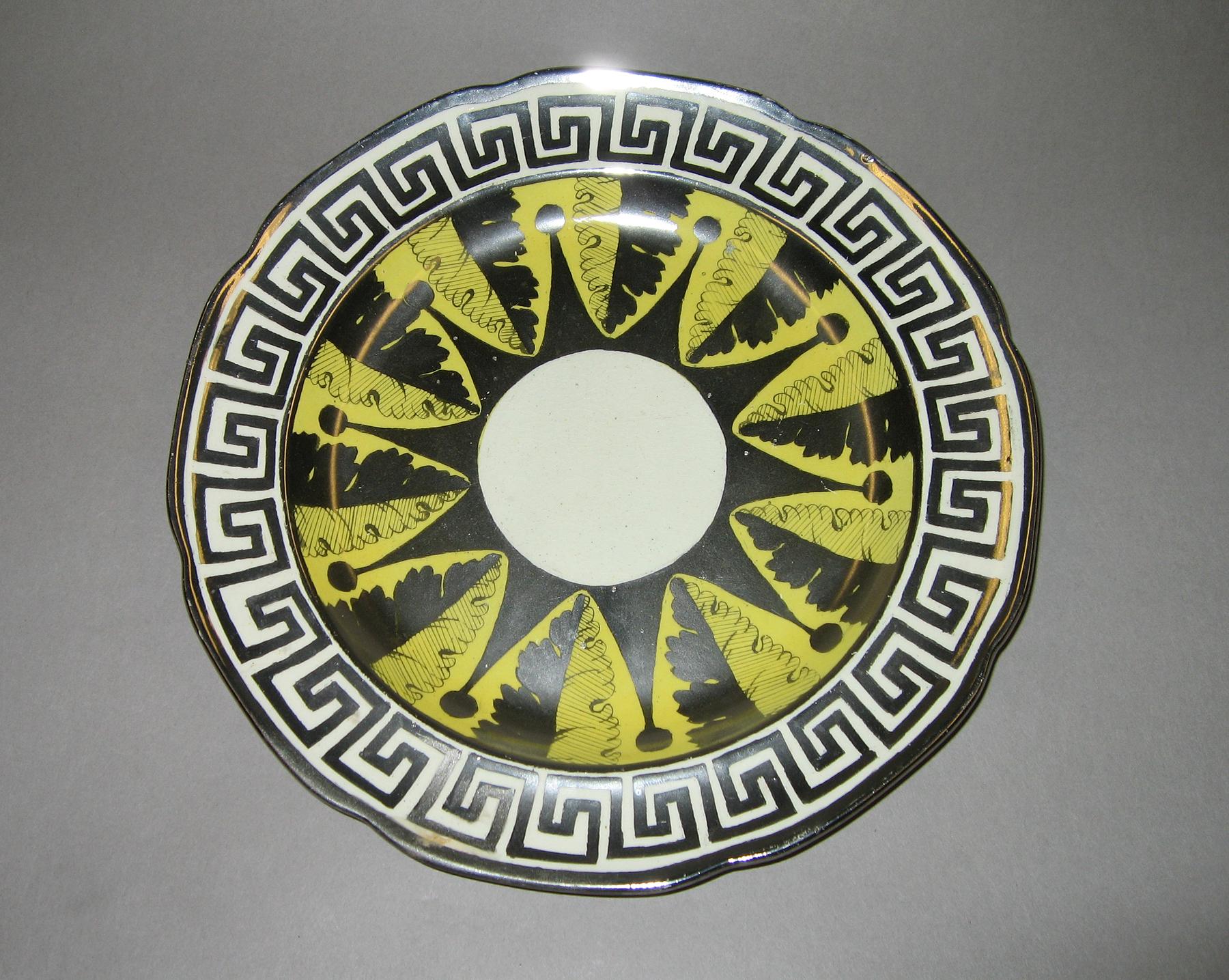 1958.1290 Silver and canary luster plate