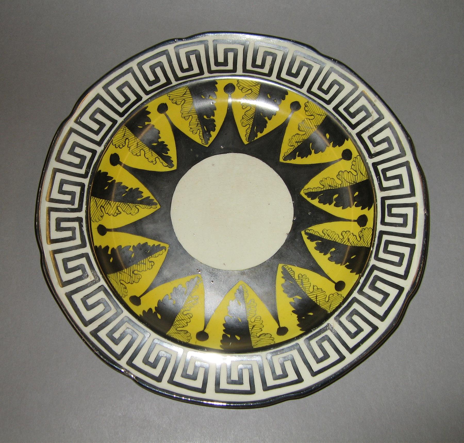 1958.1292 Silver and canary luster plate