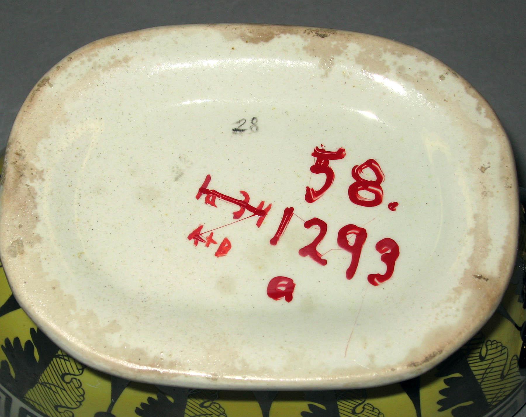1958.1293 A Lusterware sauce tureen (underside)