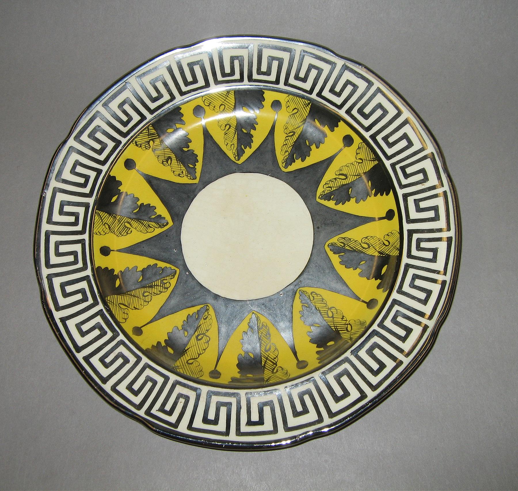 1958.1301 Silver and canary luster plate