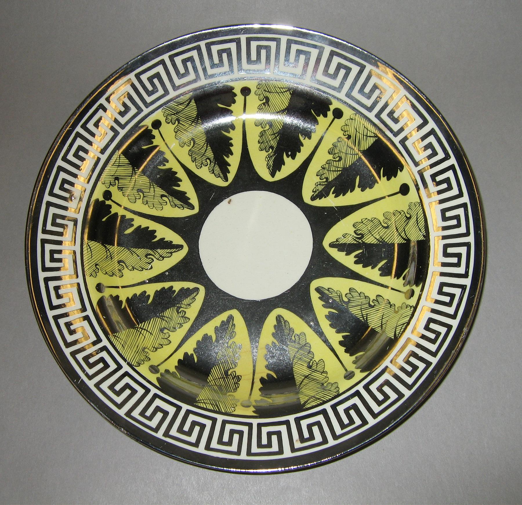 1958.1324 Silver and canary luster plate