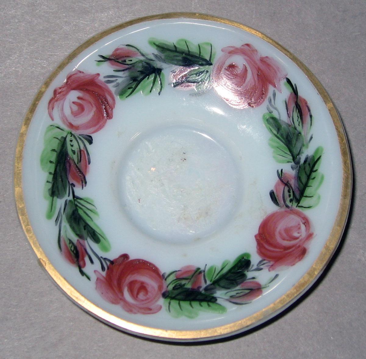 1958.1429.002 B White glass saucer