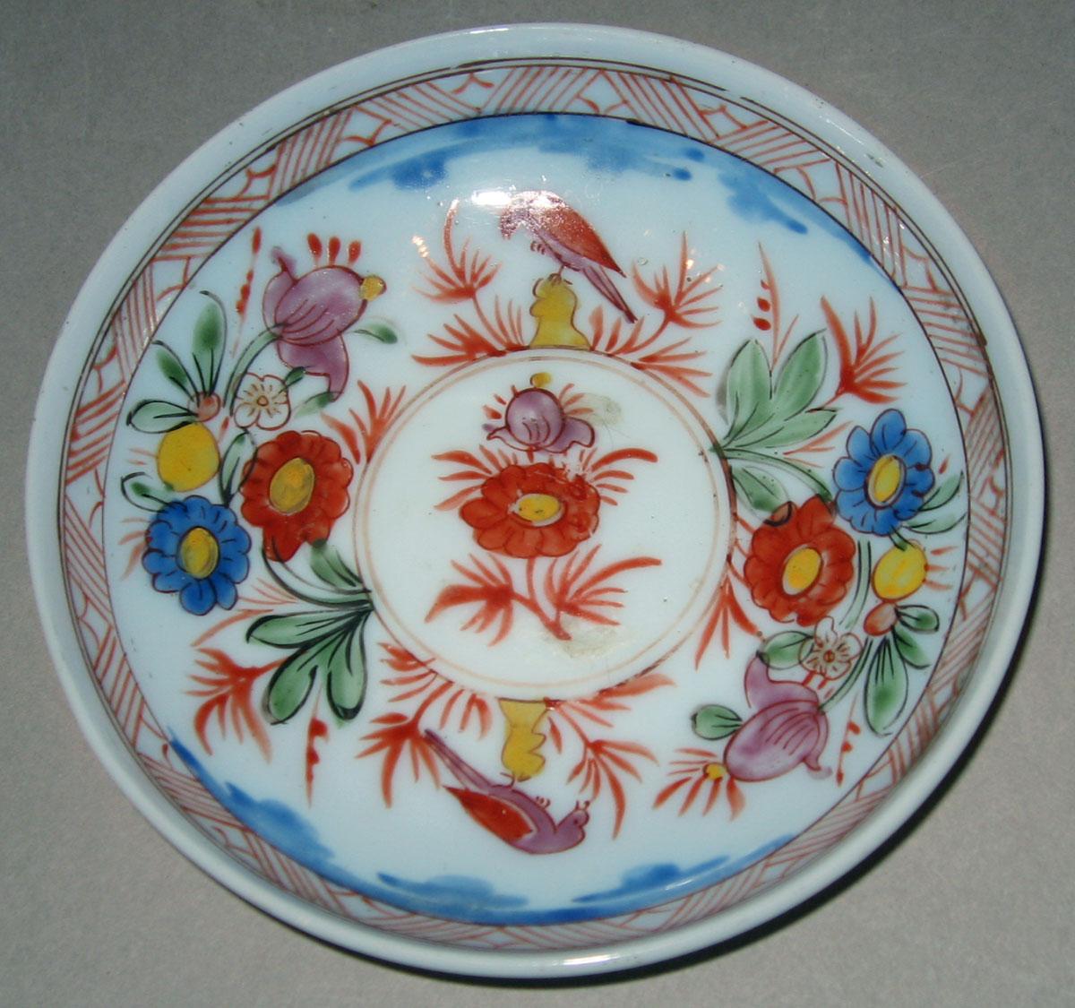 1958.1430 B White glass saucer
