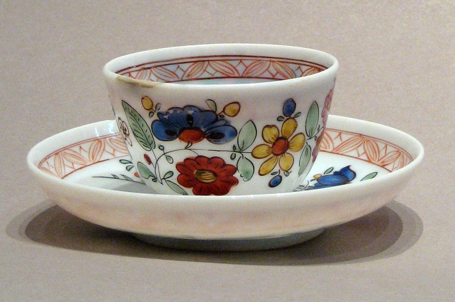 1958.1433 A, B White Glass Teabowl and Saucer