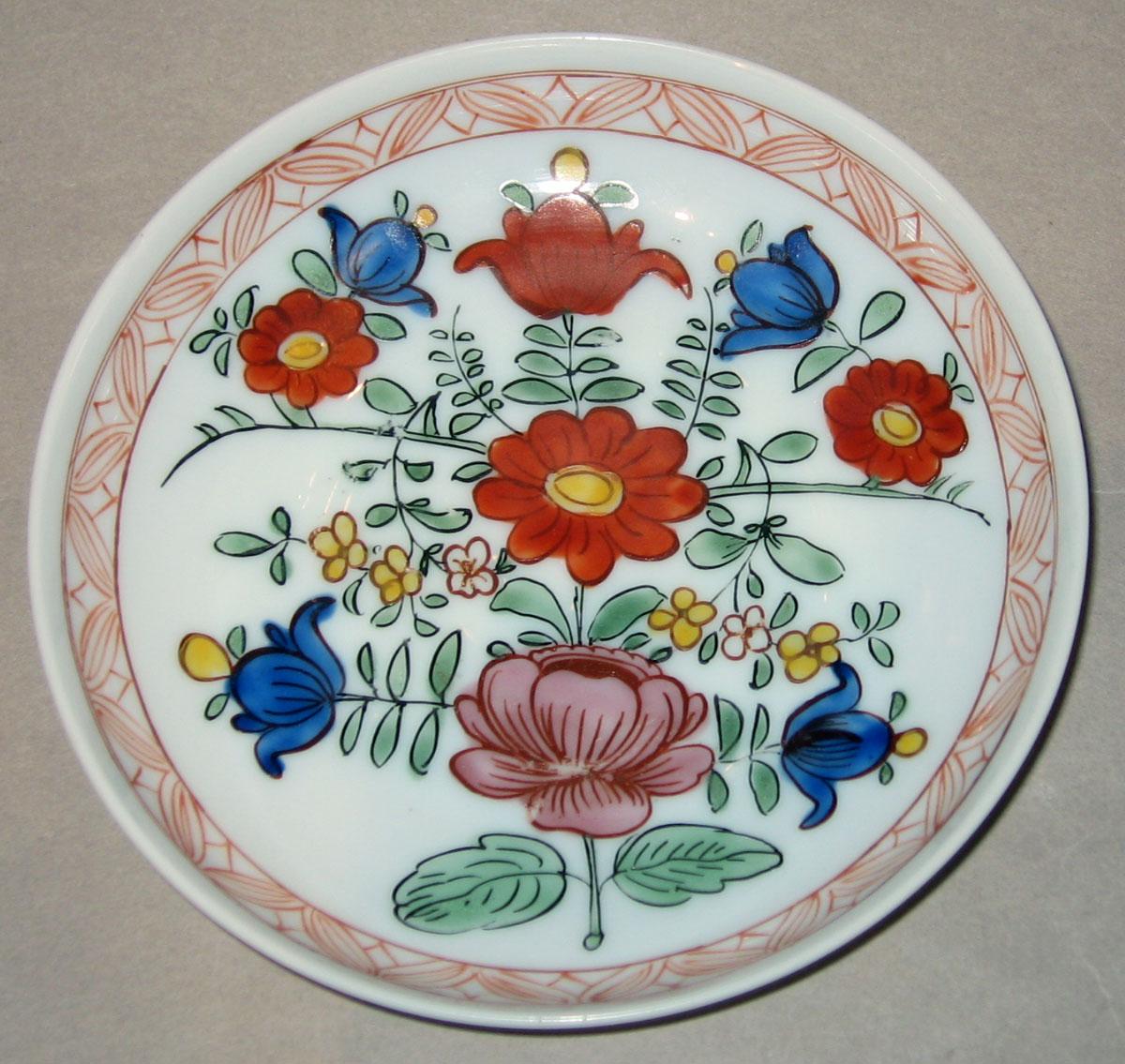 1958.1433 B White Glass Saucer